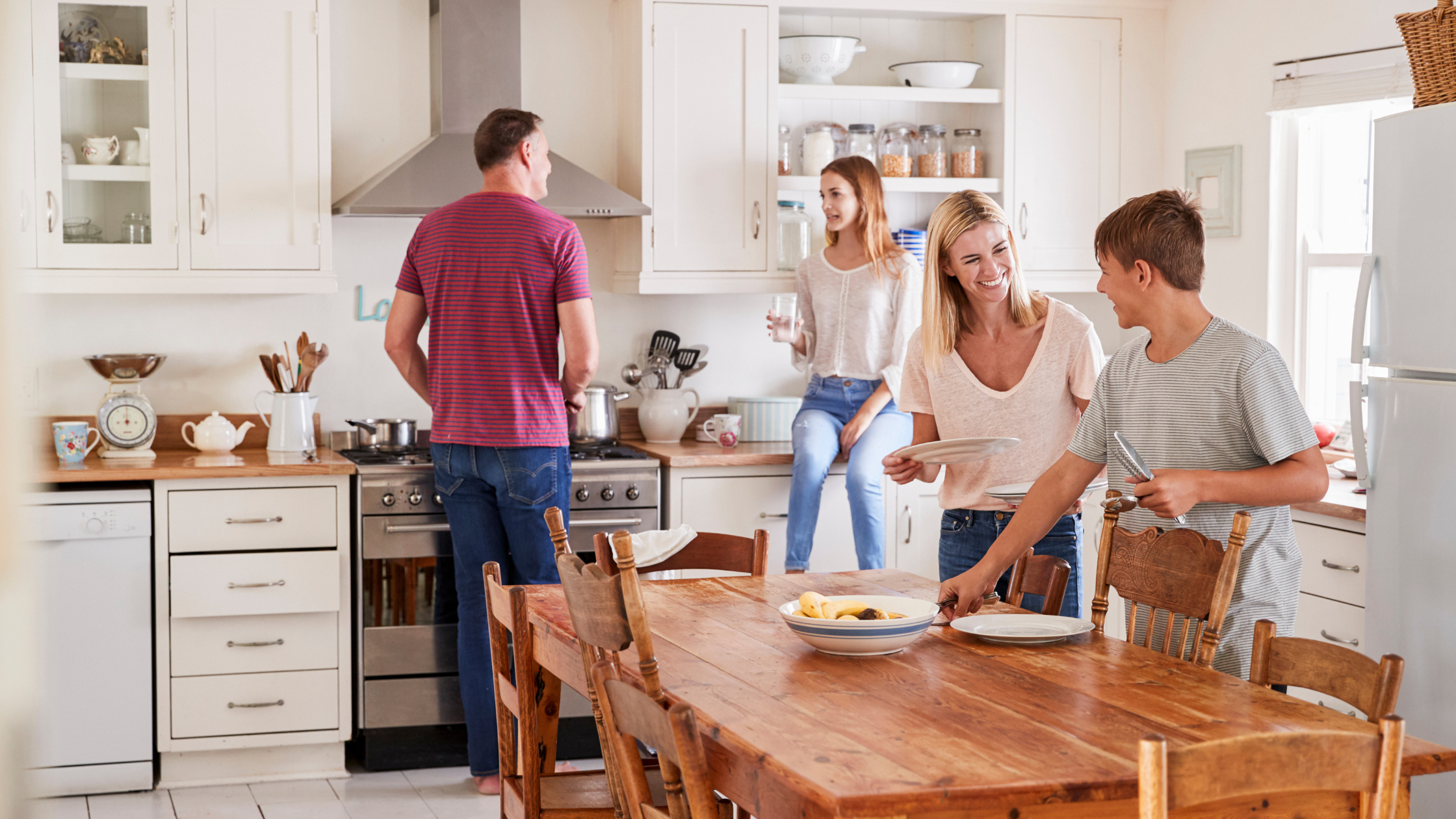 Happy blended Idaho family prepping for dinner